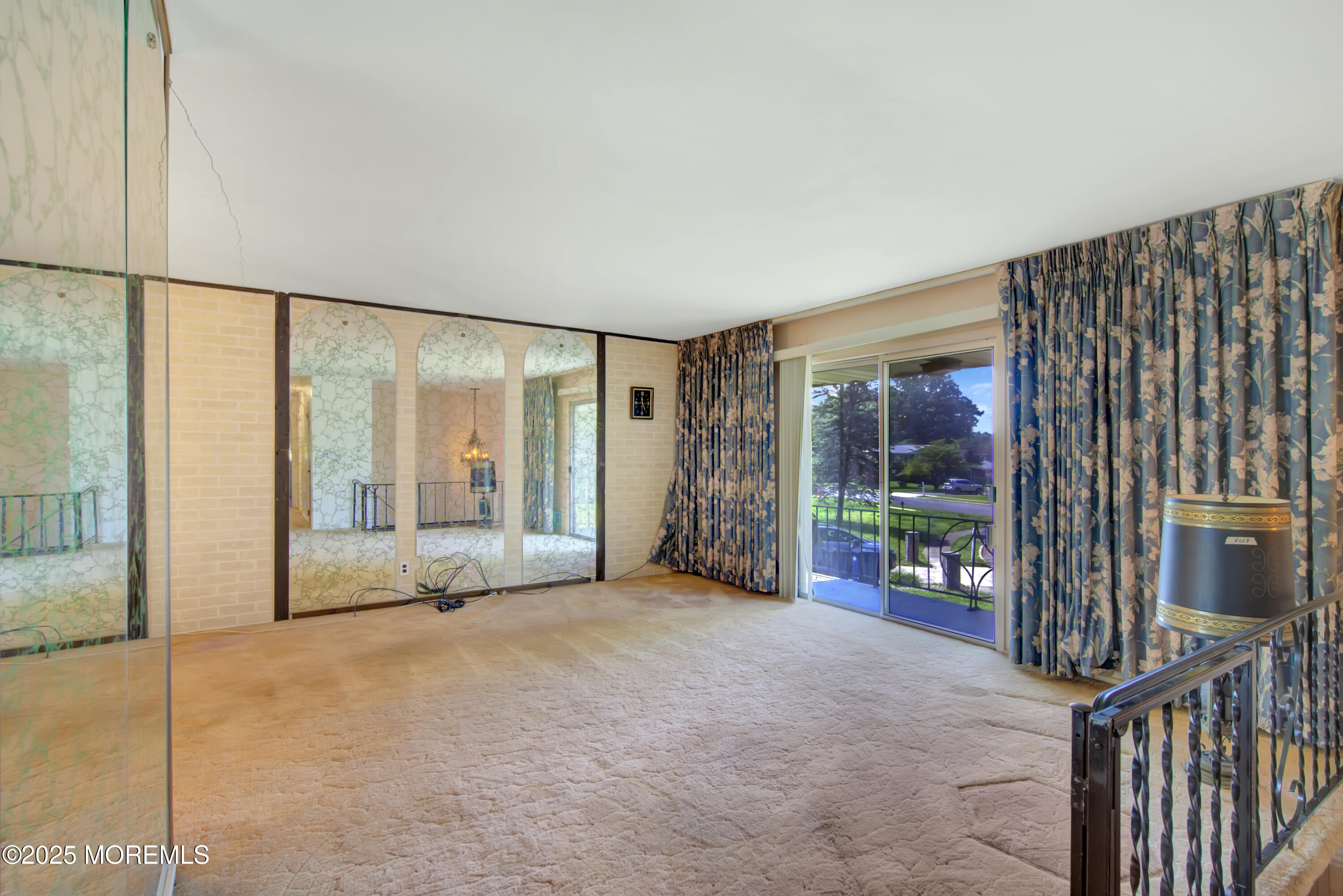 16 Burdge Drive Howell, NJ 07731 - Photo 6 of 30 a big room with windows and a flat screen tv