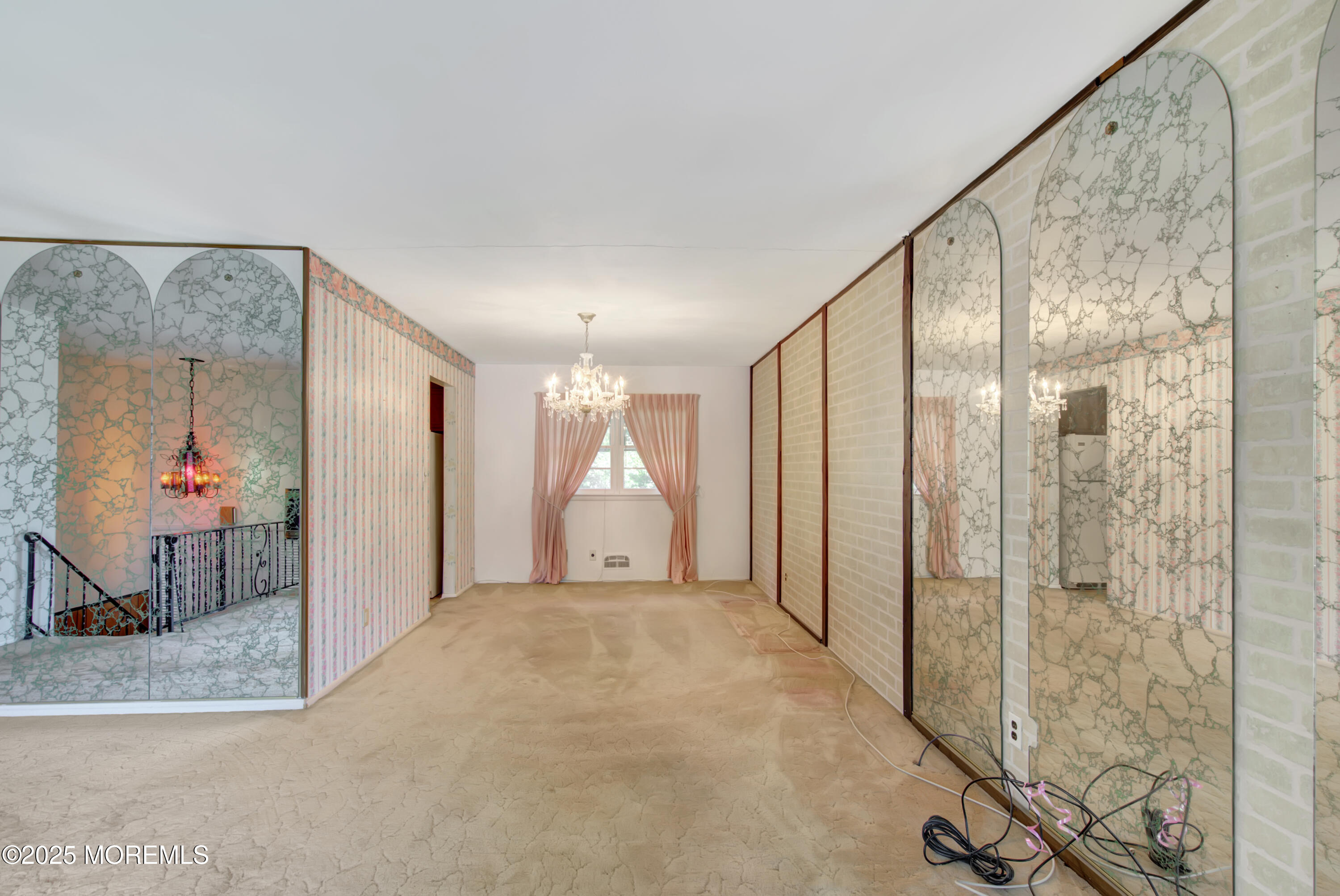 16 Burdge Drive Howell, NJ 07731 - Photo 7 of 30 a view of a hallway with a large window