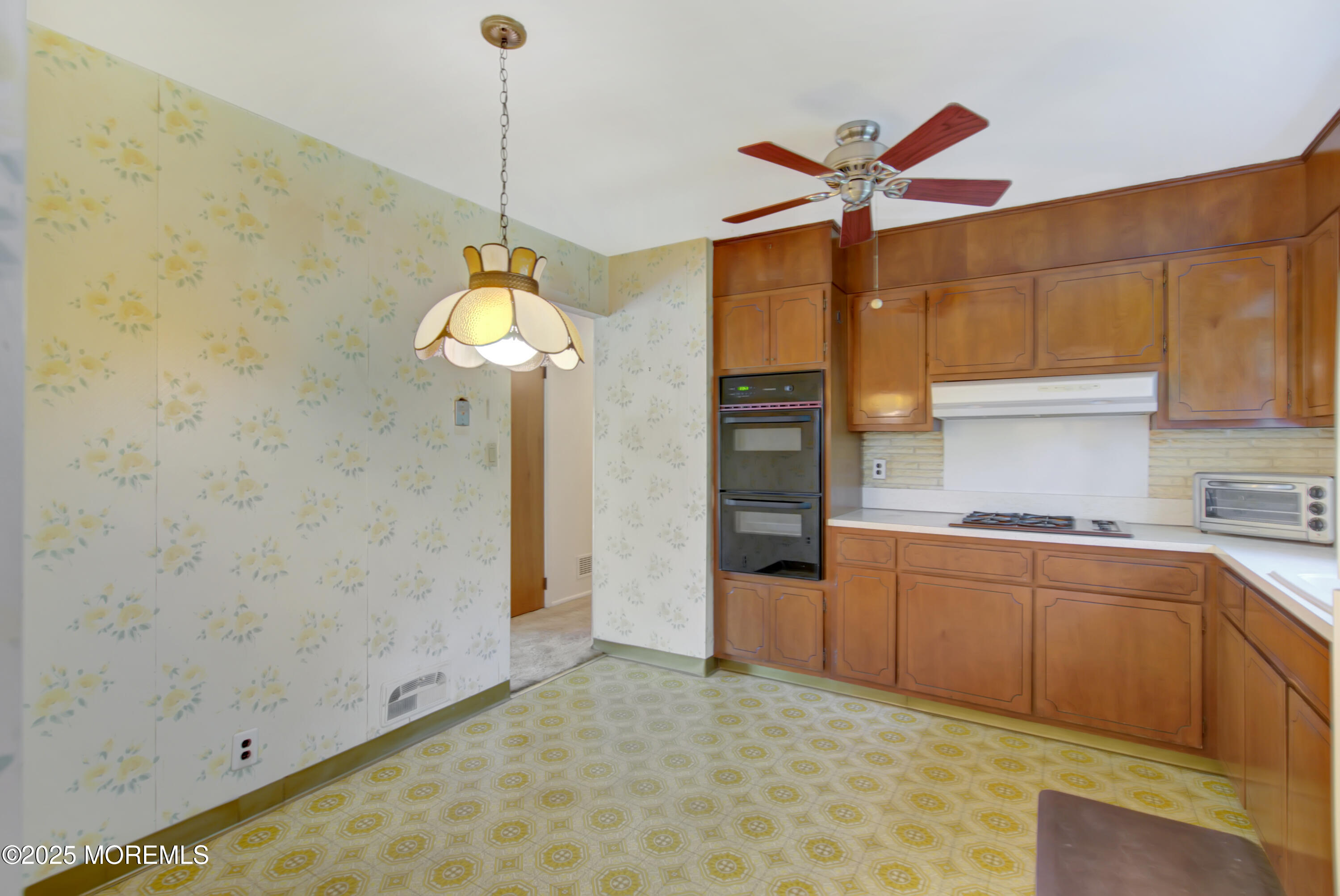 16 Burdge Drive Howell, NJ 07731 - Photo 10 of 30 a kitchen with stainless steel appliances granite countertop a sink a window and refrigerator