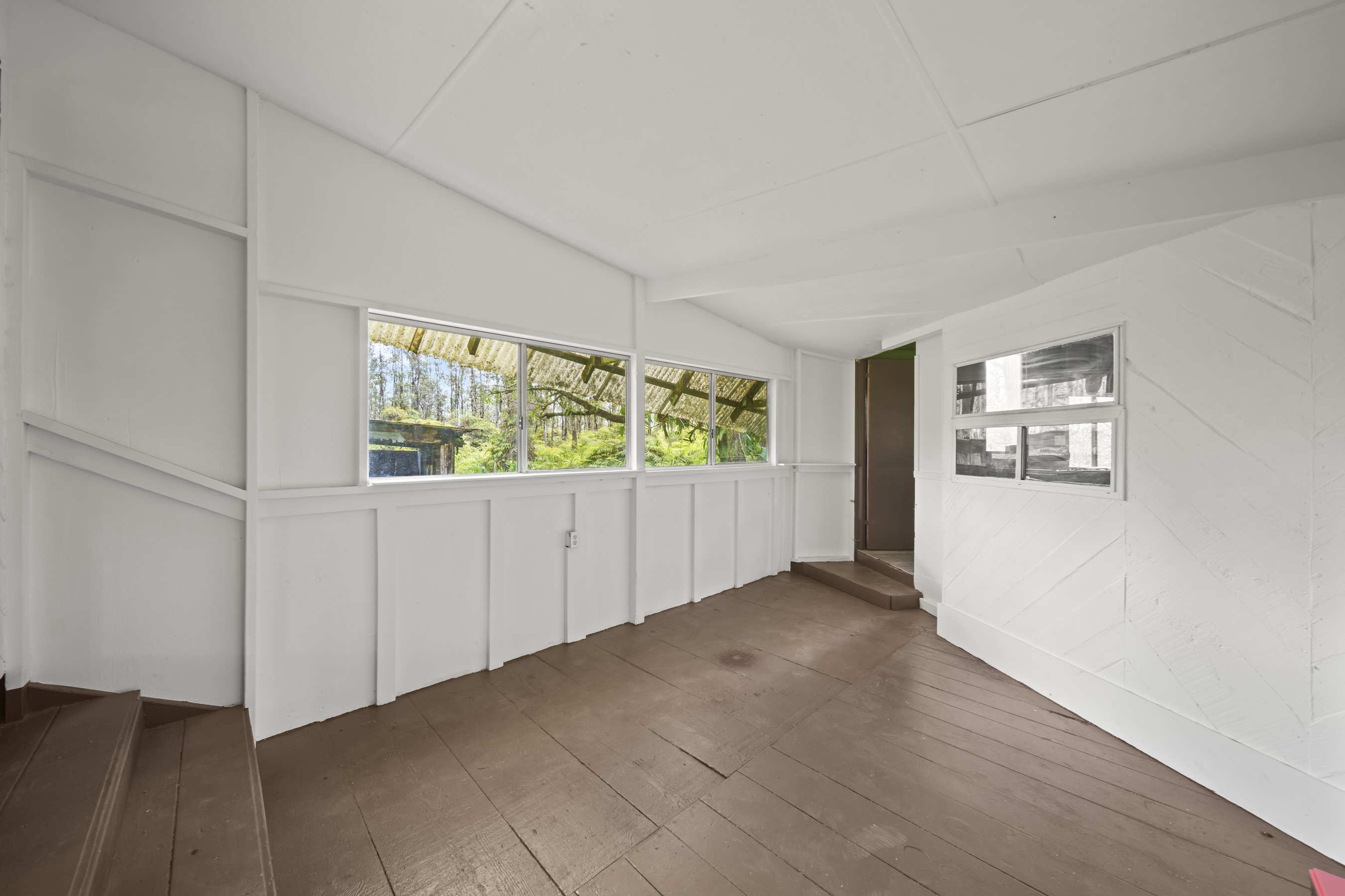 16-1857 Hopue Road Mountain View, HI 96771 - Photo 17 of 30 an empty room with windows