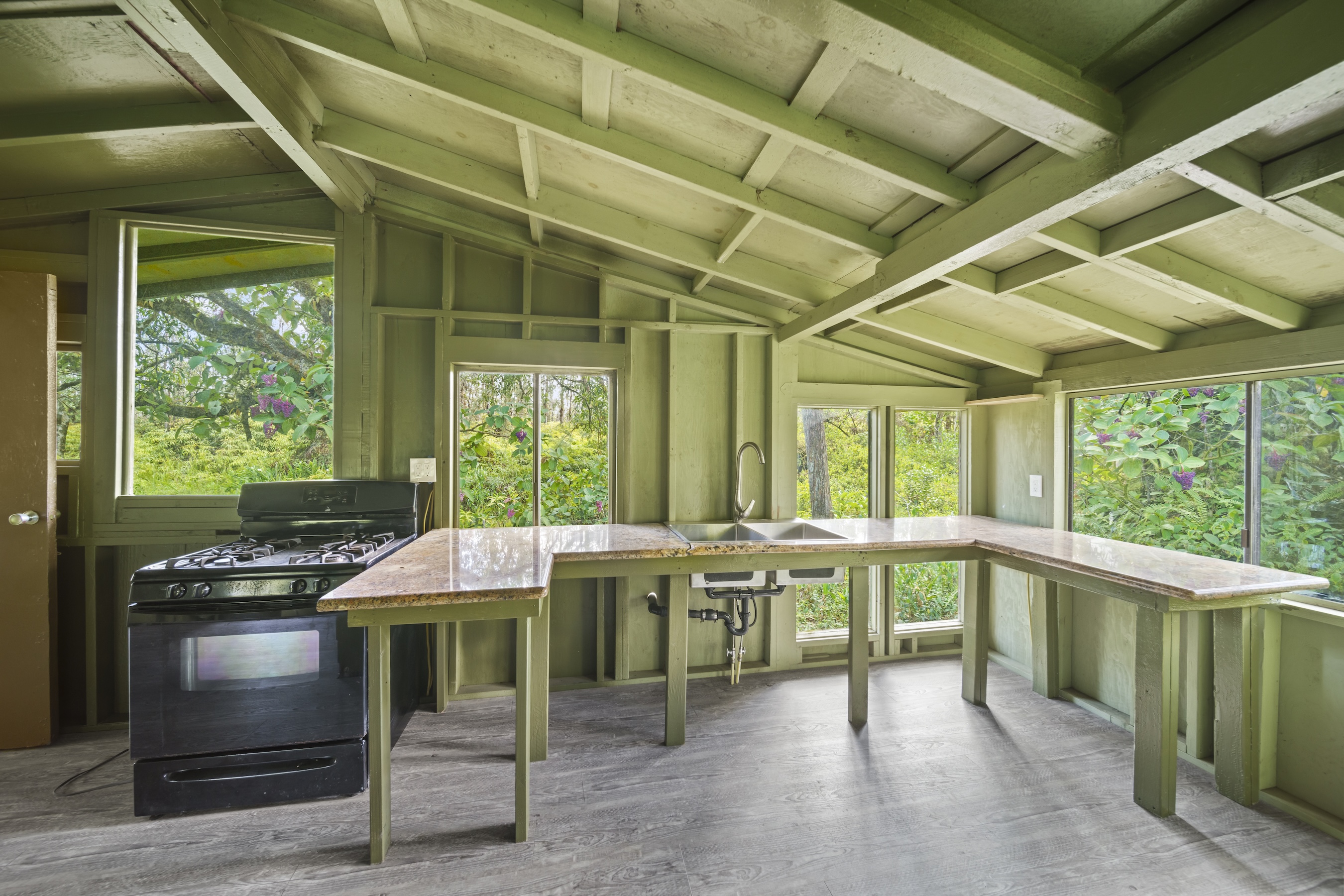16-1857 Hopue Road Mountain View, HI 96771 - Photo 19 of 30 a view of a room with open kitchen
