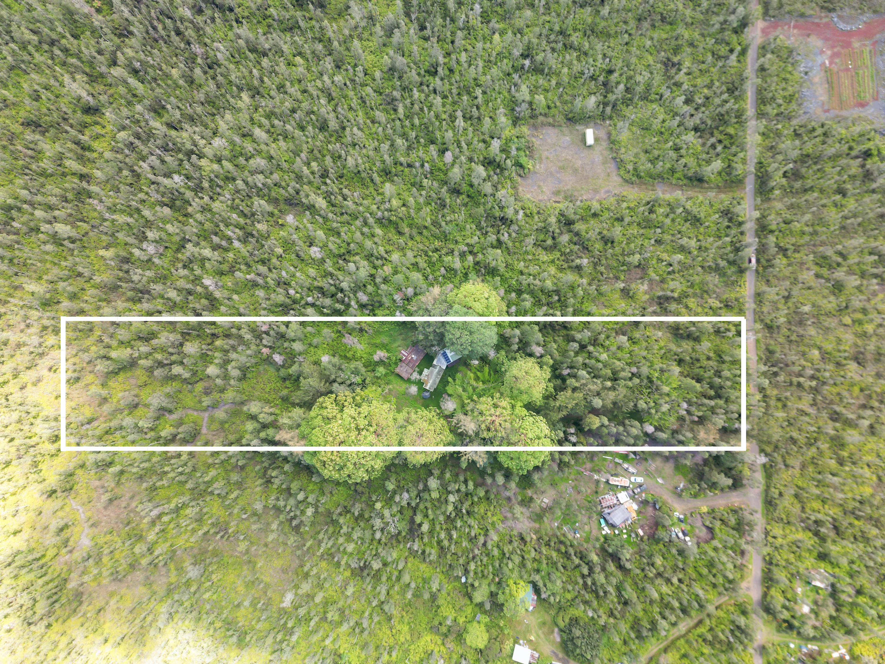 16-1857 Hopue Road Mountain View, HI 96771 - Photo 2 of 30 a view of a fence