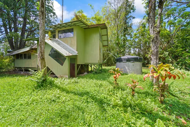 a house view with a garden space