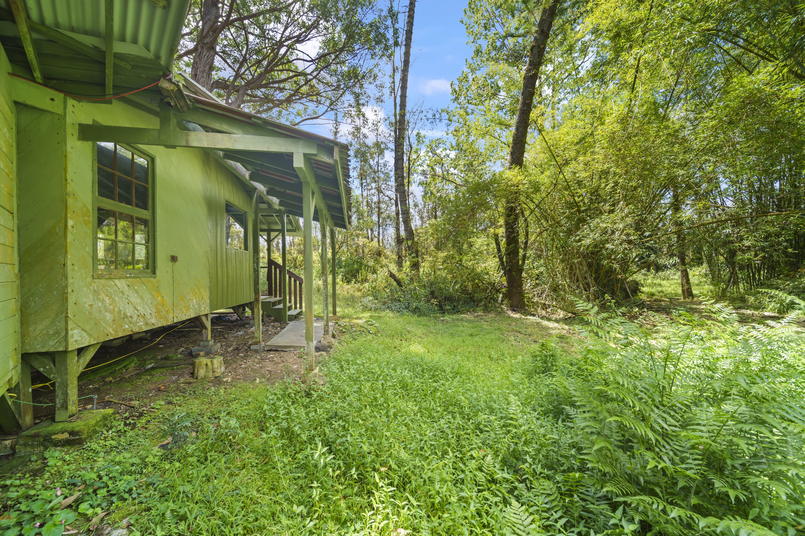 16-1857 Hopue Road Mountain View, HI 96771 - Photo 8 of 30 a view of a back yard