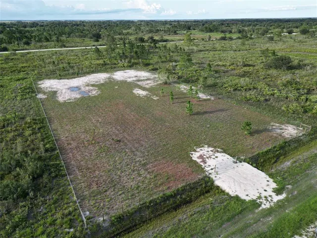 a view of a lake in middle of the town