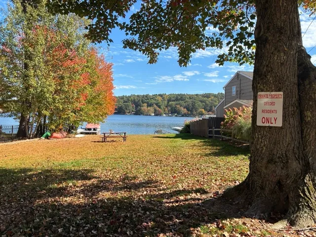 a view of swimming pool from a lake