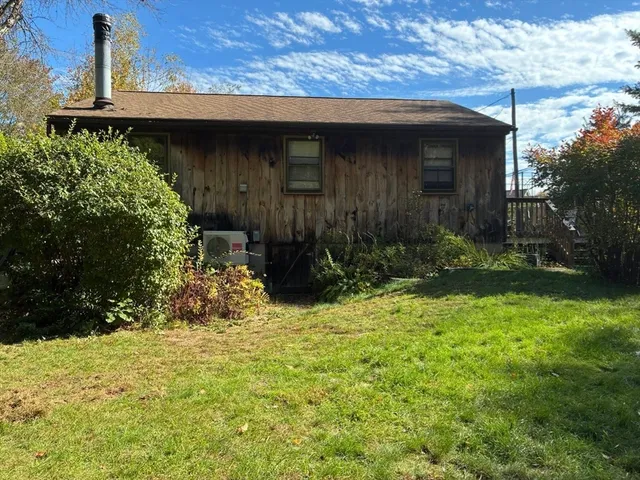 a view of backyard with sink and garden