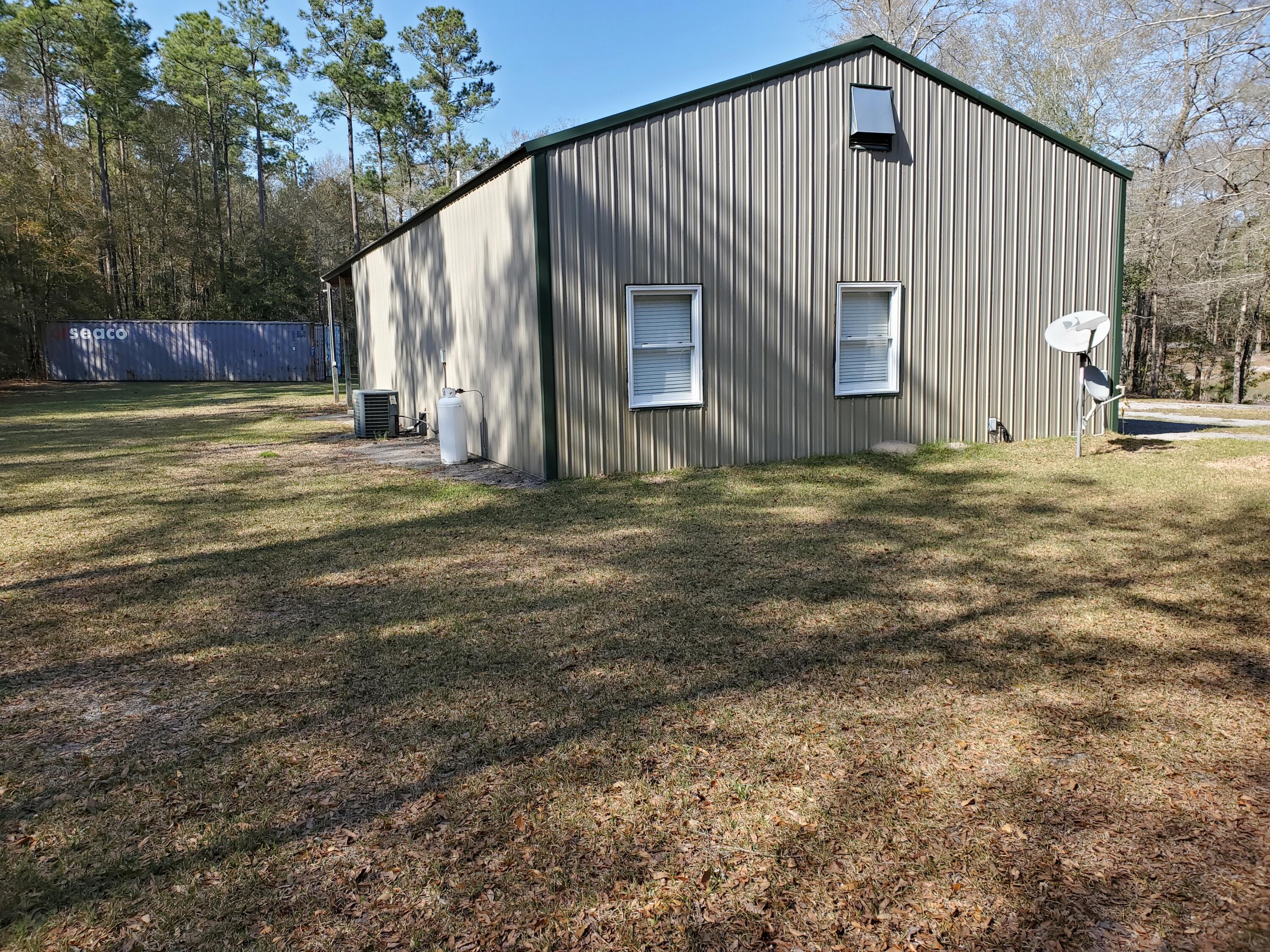 354 Old Cemetery Road Jamestown, SC 29453 - Photo 18 of 25 Home Side and Back View