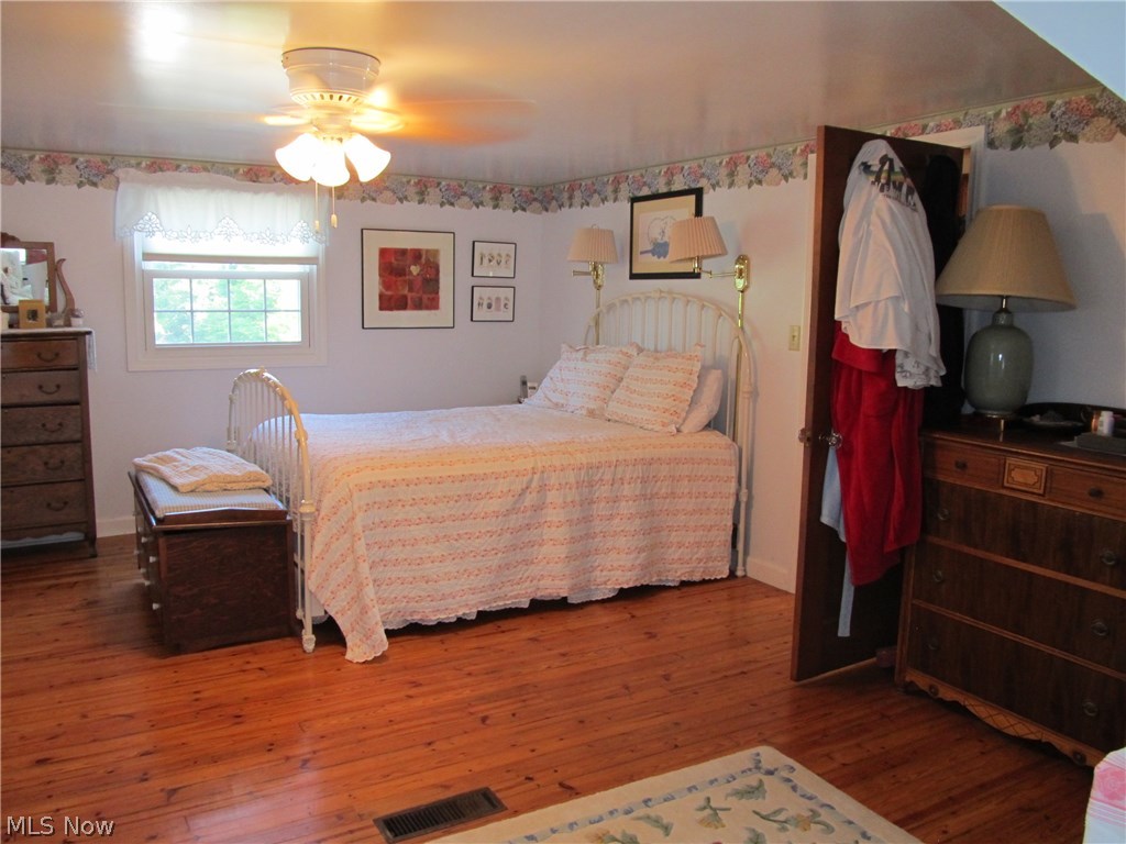 8341 Eagle Road Willoughby, OH 44094 - Photo 6 of 8 Master with beautiful hardwood floors