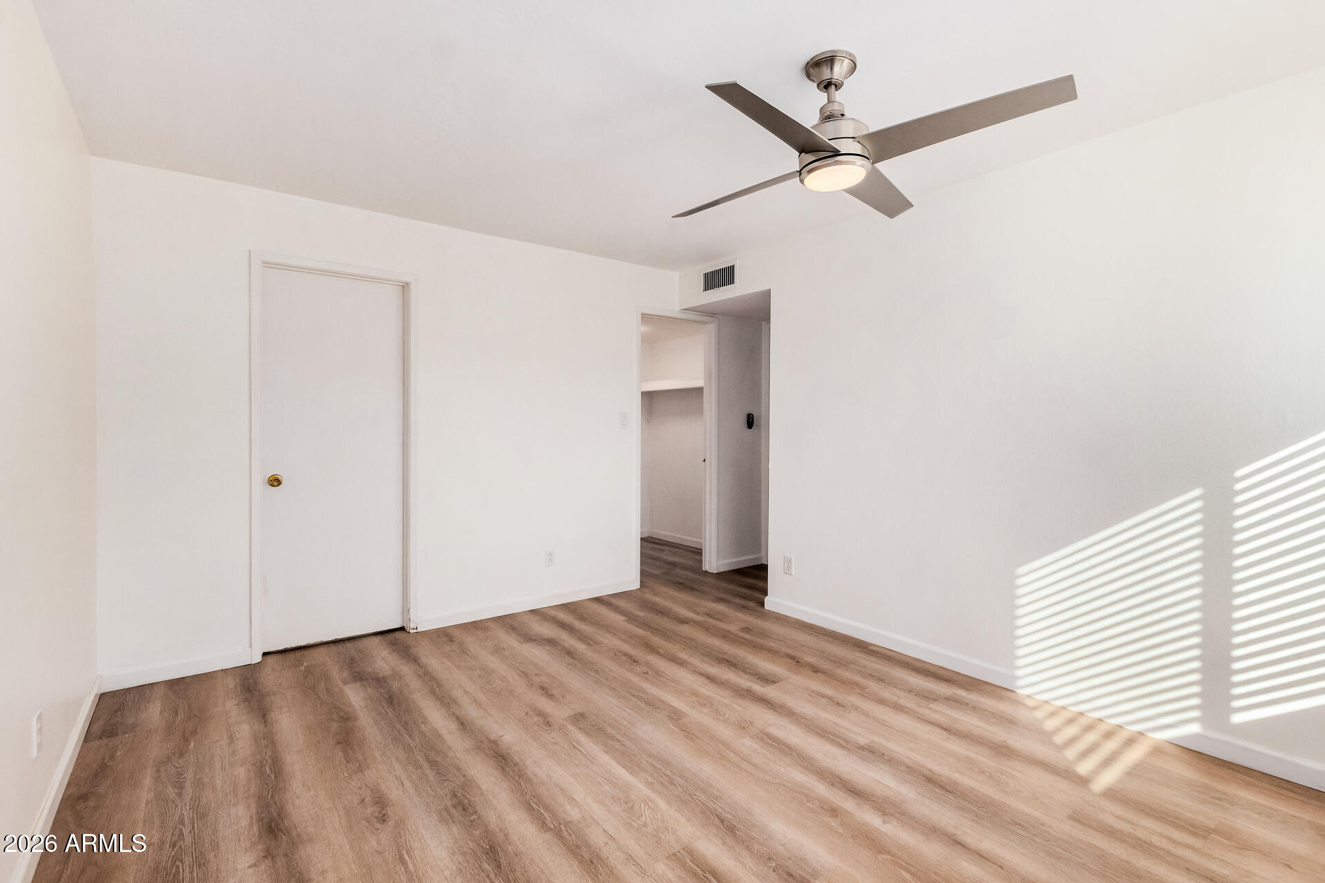 11009 South Tewa Street Phoenix, AZ 85044 - Photo 12 of 26 a view of a livingroom with a ceiling fan