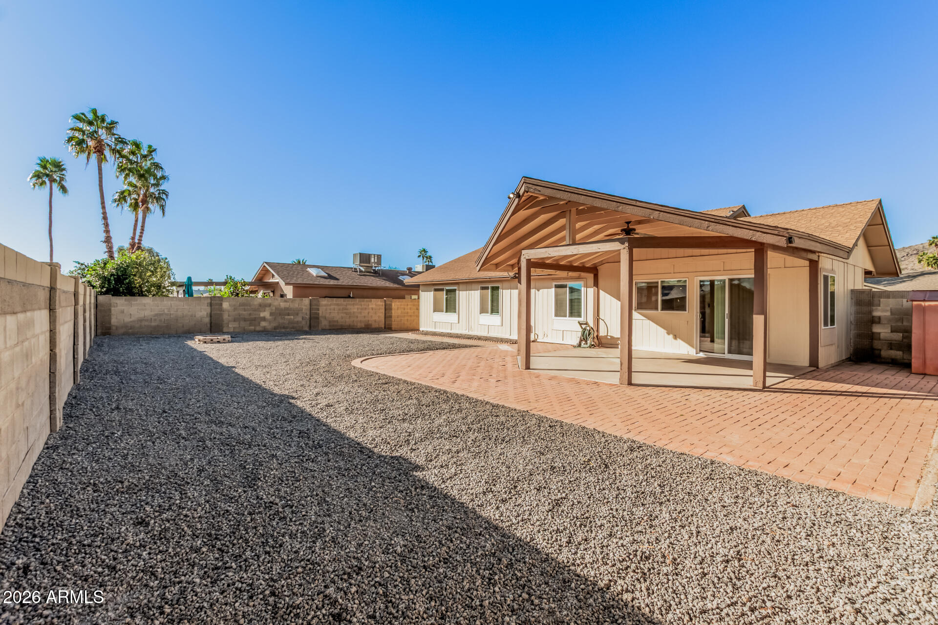 11009 South Tewa Street Phoenix, AZ 85044 - Photo 22 of 26 a front view of a house with a yard