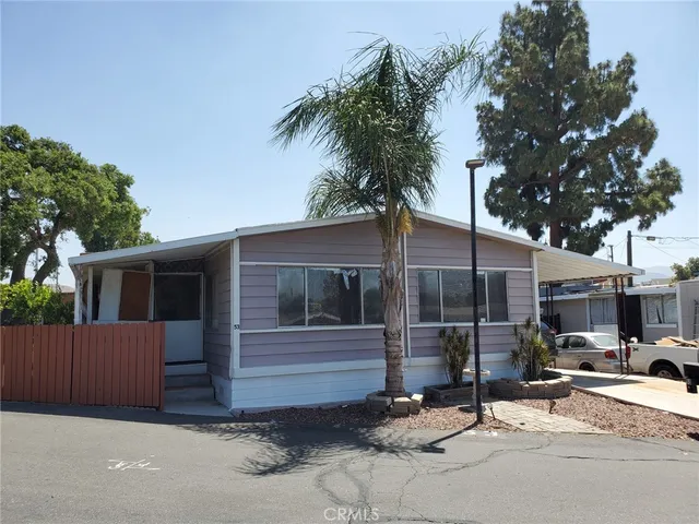 a view of backyard with green space