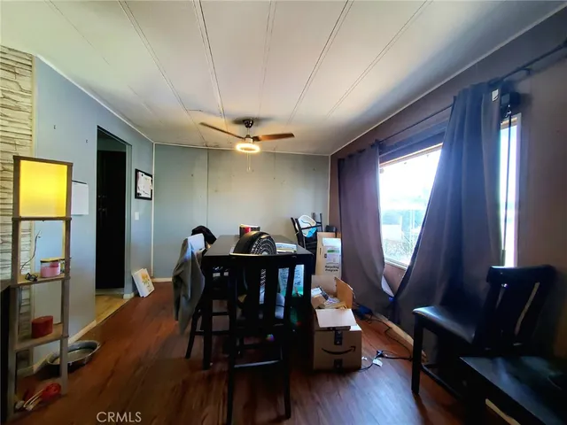 a kitchen with refrigerator cabinets and furniture