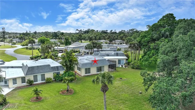 aerial view of a house with a garden