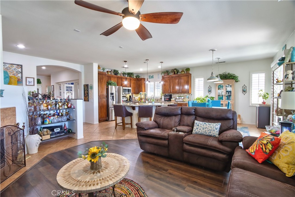 27929 Crystal Spring Drive Menifee, CA 92584 - Photo 14 of 50 a living room with furniture and kitchen view