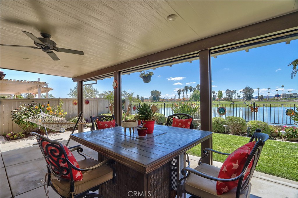 27929 Crystal Spring Drive Menifee, CA 92584 - Photo 31 of 50 a outdoor dining space with furniture and outdoor view