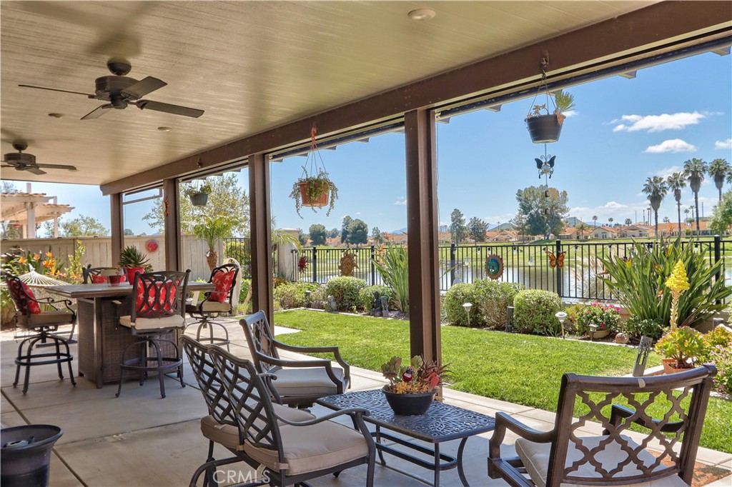 27929 Crystal Spring Drive Menifee, CA 92584 - Photo 32 of 50 a view of a porch with furniture and garden