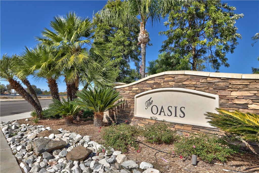 27929 Crystal Spring Drive Menifee, CA 92584 - Photo 46 of 50 a sign that is sitting in front of flowers