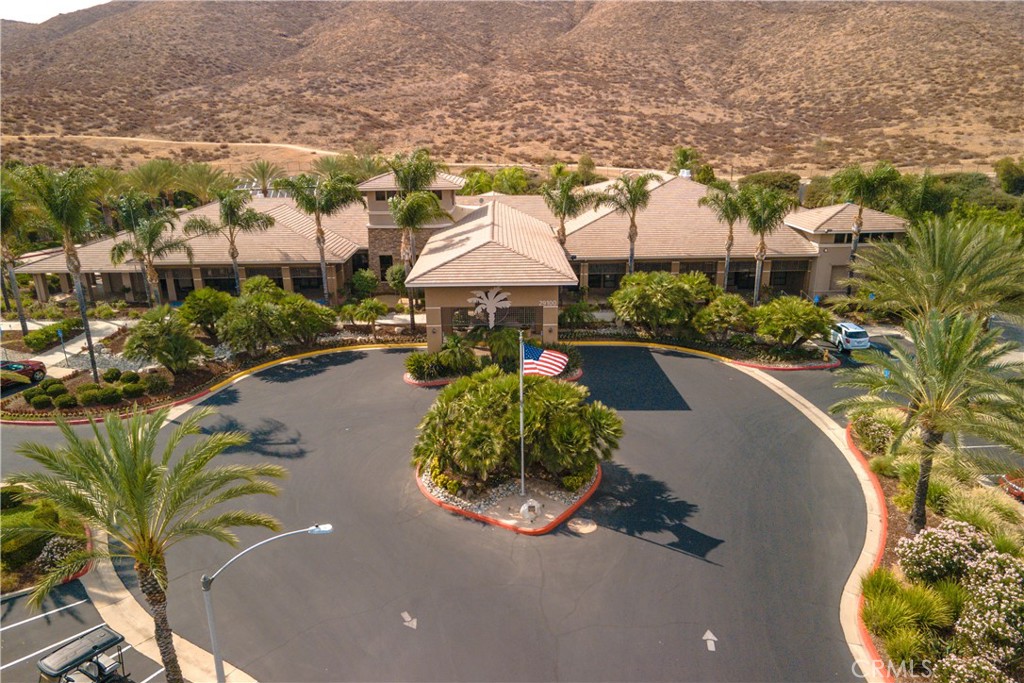 27929 Crystal Spring Drive Menifee, CA 92584 - Photo 47 of 50 an aerial view of a house with a yard and lake view