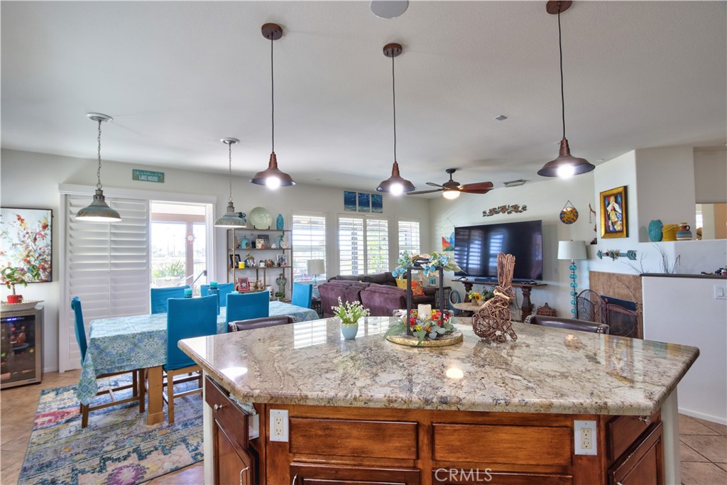 27929 Crystal Spring Drive Menifee, CA 92584 - Photo 9 of 50 a view of a dining table and chairs