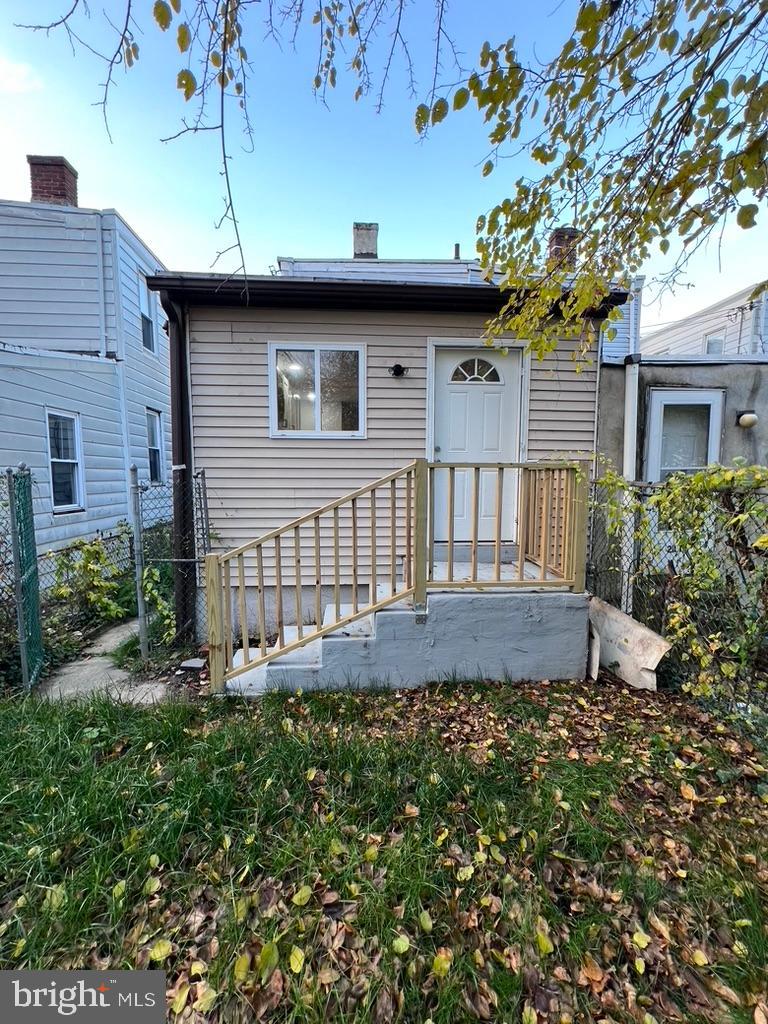 2117 West 4th Street Chester, PA 19013 - Photo 35 of 35 a front view of a house with a garden