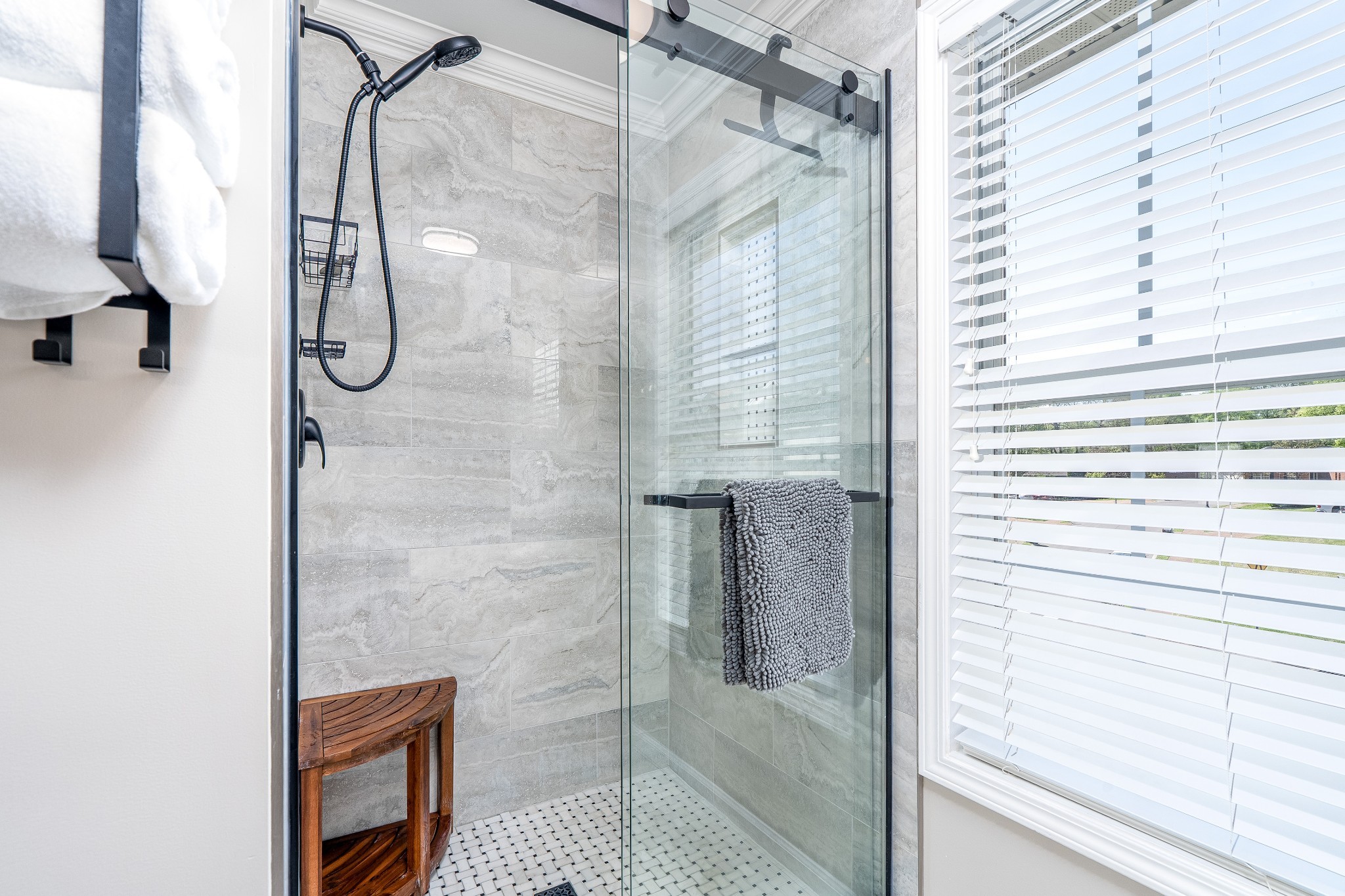 2102 Burgess Lane Spring Hill, TN 37174 - Photo 23 of 45 a bathroom with a glass shower door