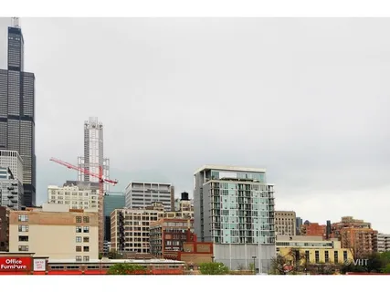 a view of city with tall buildings
