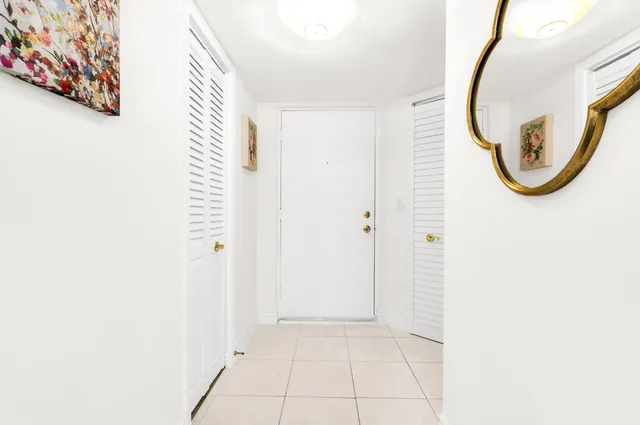 a view of a livingroom with car parked