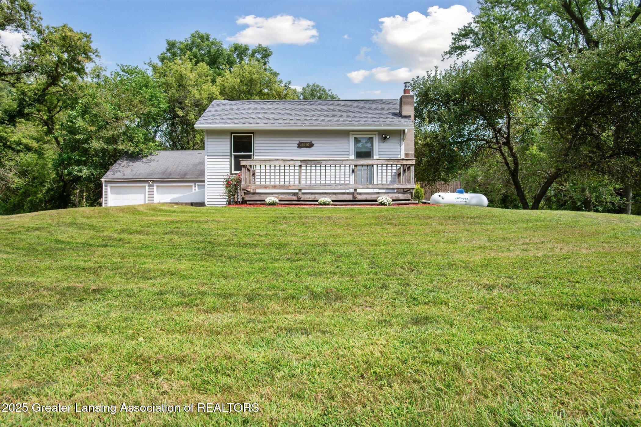 2310 Gilbert Road Lansing, MI 48911 - Photo 3 of 32 Front