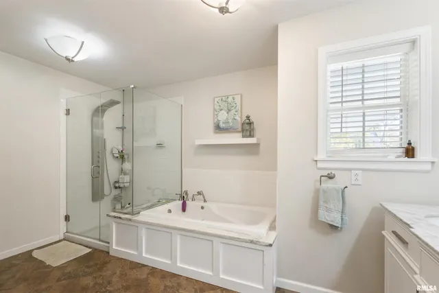 a bathroom with a double vanity sink mirror and double