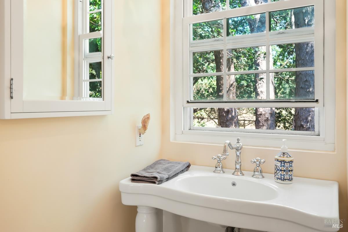 1846 Indian Valley Road, Unit A Novato, CA 94947 - Photo 40 of 45 a bathroom with a sink and a window