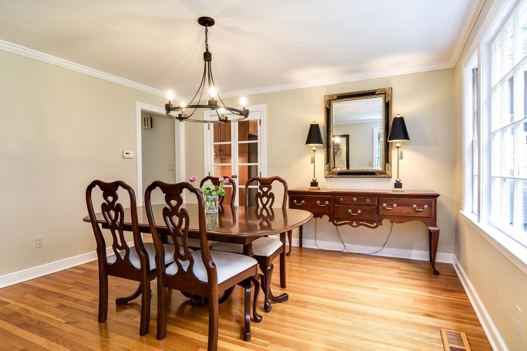 114 Hunters Ridge Road Concord, MA 01742 - Photo 11 of 38 a view of a a dining room with furniture window and wooden floor