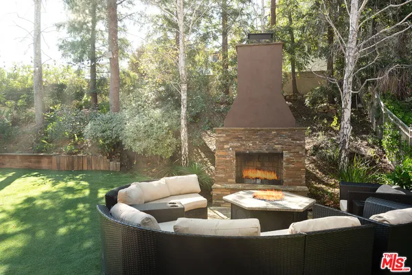 a view of swimming pool with outdoor seating