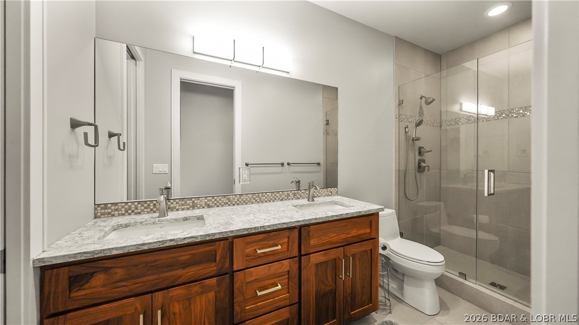 777 Malibu Road Osage Beach, MO 65065 - Photo 61 of 100 Enjoy the convenience of en-suite living. Every be