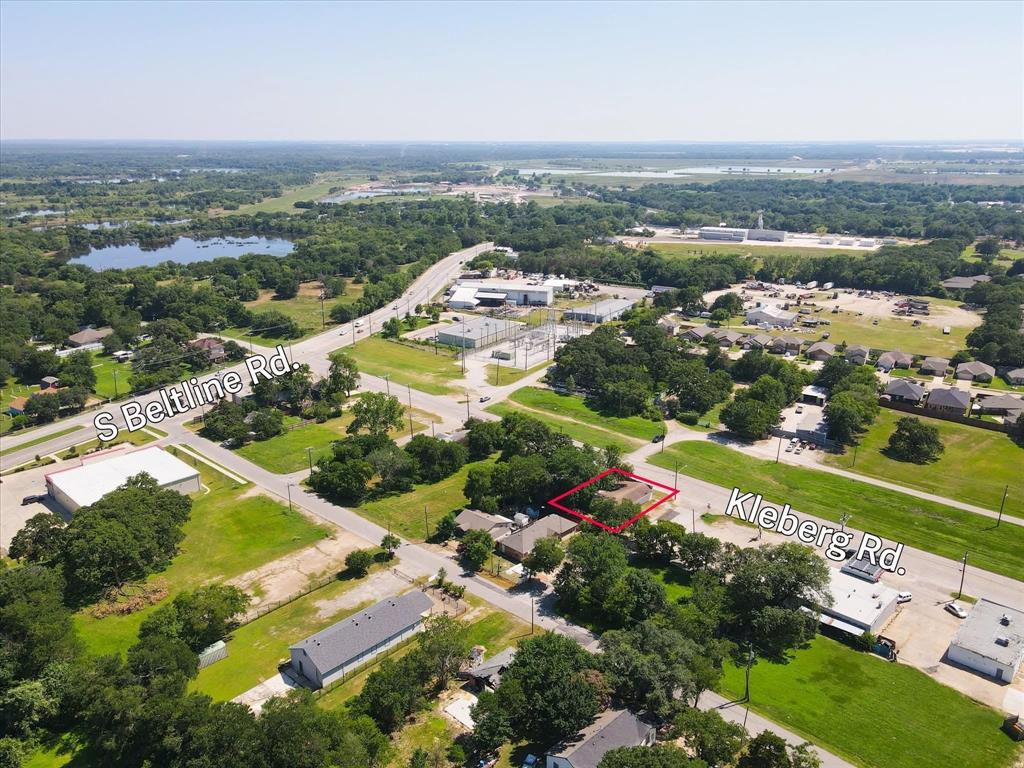 13405 Kleberg Road Dallas, TX 75253 - Photo 4 of 8 an aerial view of residential houses with outdoor space