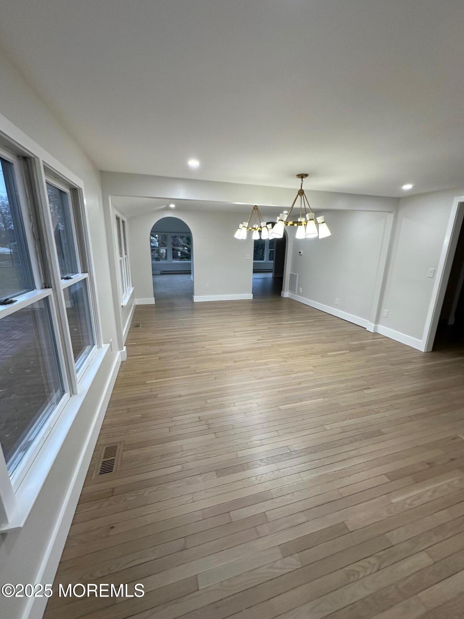 469 Wall Street Eatontown, NJ 07724 - Photo 3 of 17 a view of a livingroom with wooden floor
