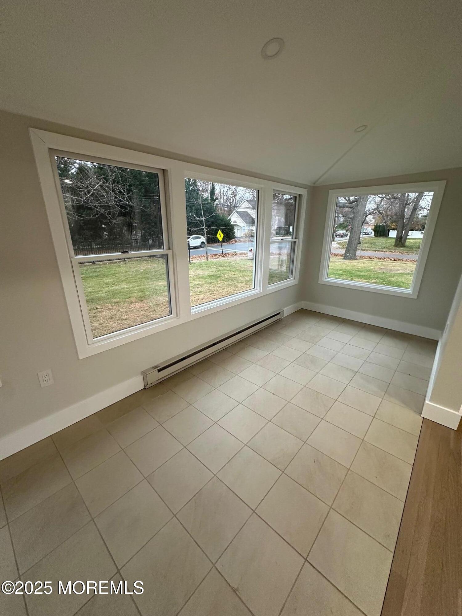 469 Wall Street Eatontown, NJ 07724 - Photo 7 of 17 an empty room with windows