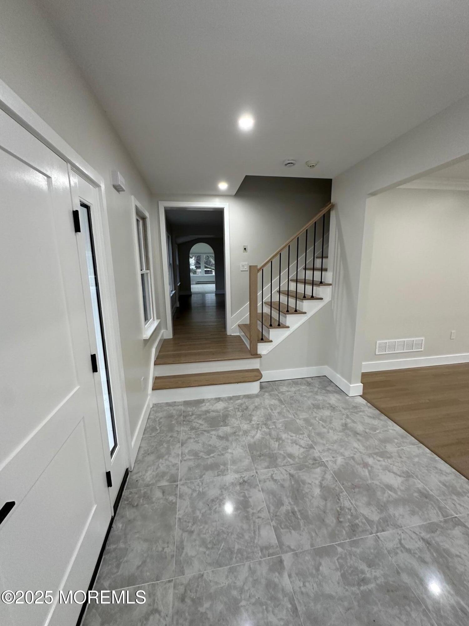 469 Wall Street Eatontown, NJ 07724 - Photo 9 of 17 a view of entryway with stairs