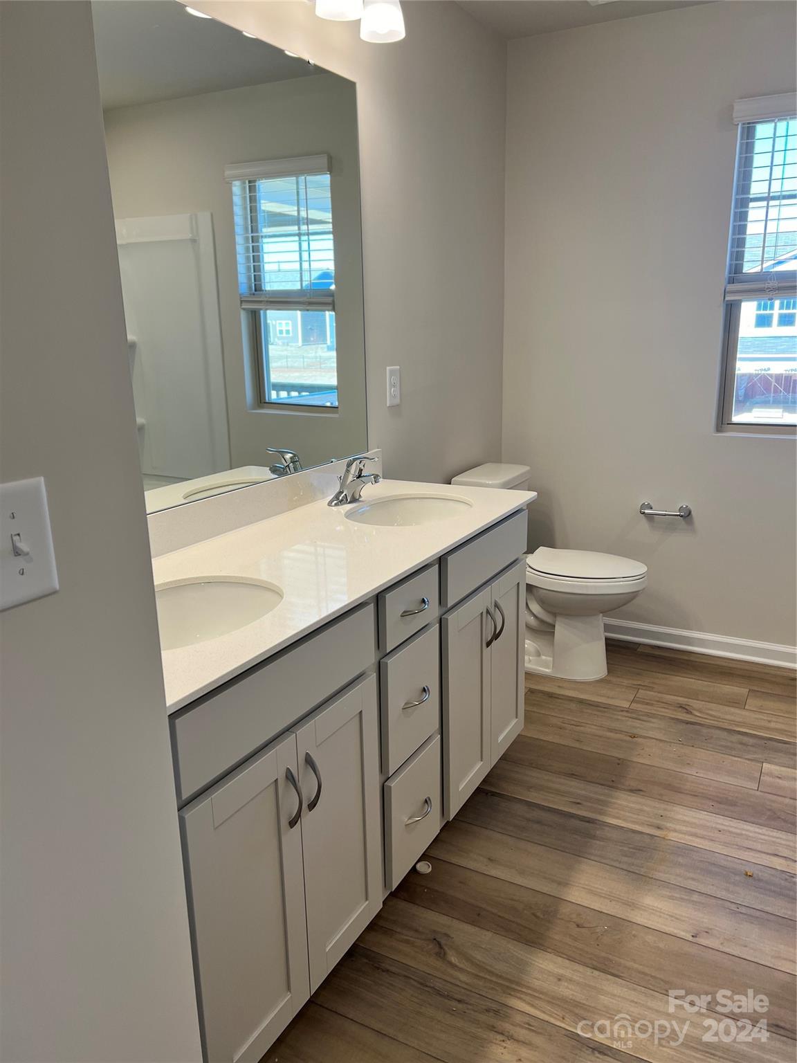 2541 Crimson Way Monroe, NC 28112 - Photo 16 of 22 a bathroom with a sink and a toilet