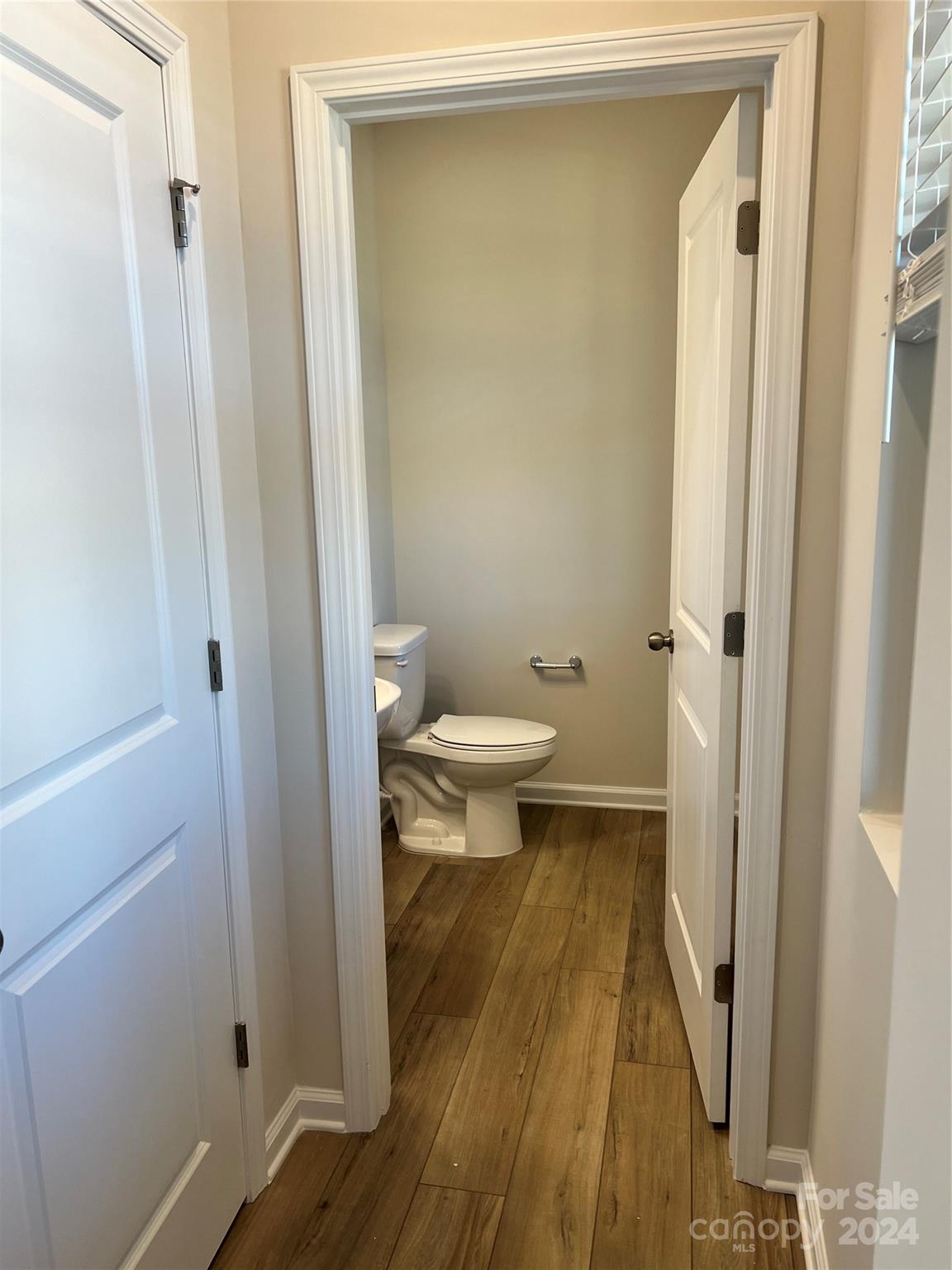 2541 Crimson Way Monroe, NC 28112 - Photo 17 of 22 a bathroom with a toilet and a shower