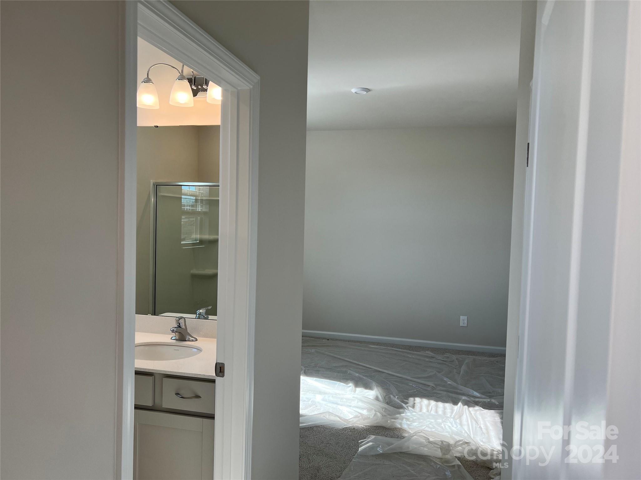 2541 Crimson Way Monroe, NC 28112 - Photo 4 of 22 a bathroom with a mirror
