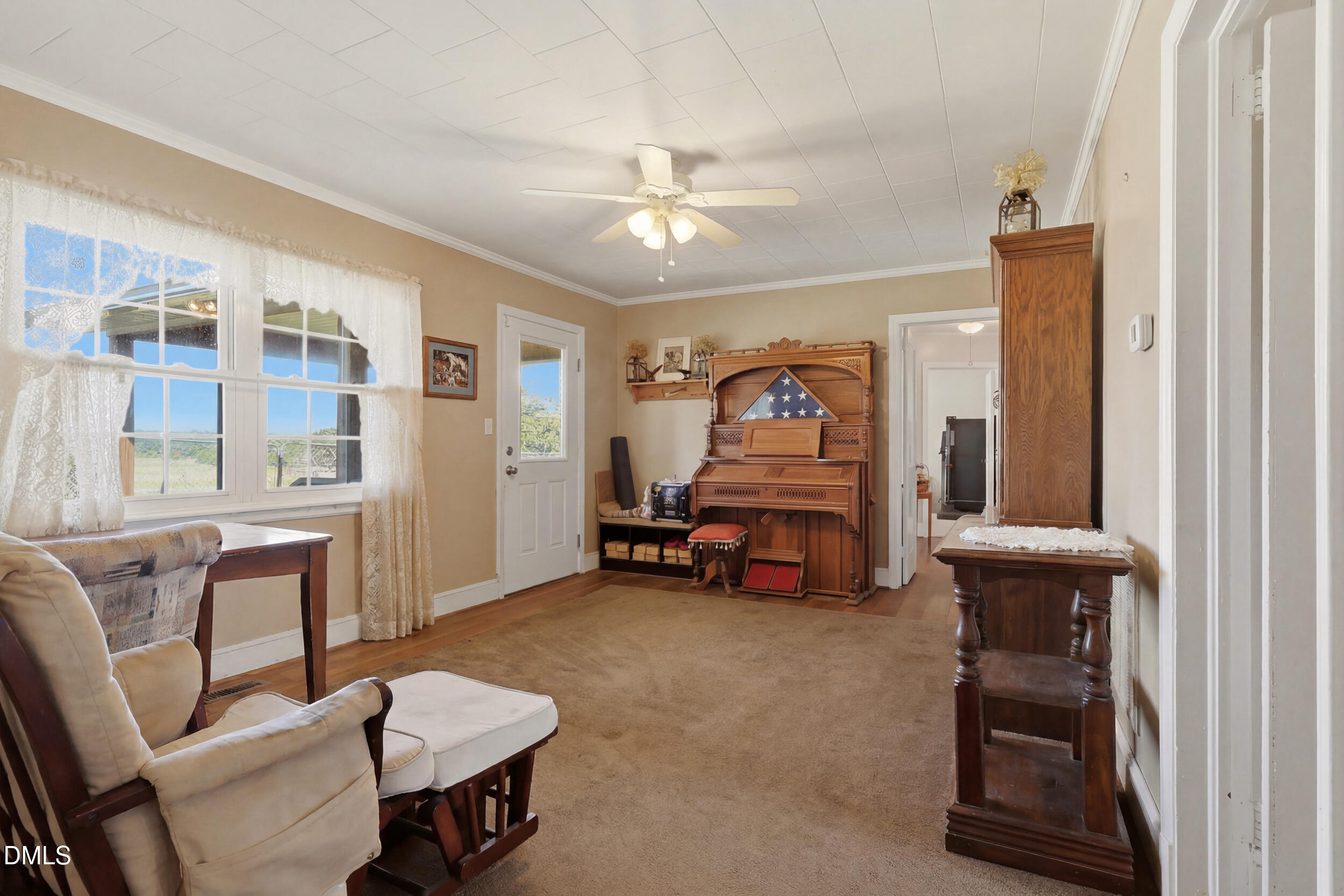 2631 South Jim Minor Road Haw River, NC 27258 - Photo 13 of 62 a living room with furniture and a gym machine