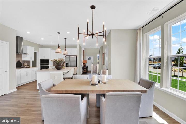 491 Hanson Street Frederick, MD 21701 - Photo 11 of 24 Bright and airy dining space with modern charm.