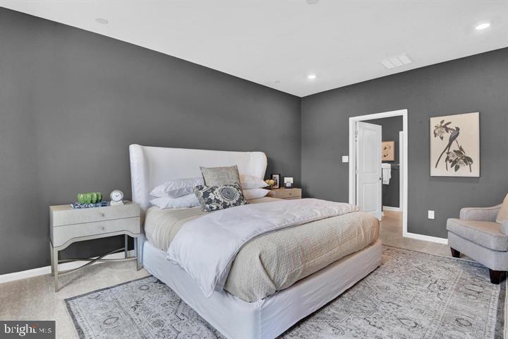 491 Hanson Street Frederick, MD 21701 - Photo 14 of 24 Serene bedroom with modern elegance.