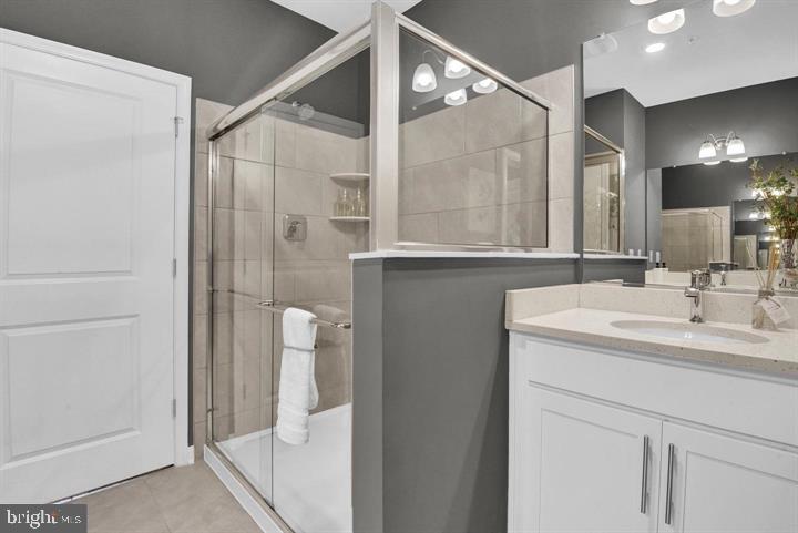 491 Hanson Street Frederick, MD 21701 - Photo 16 of 24 Sleek modern bathroom with elegant finishes.