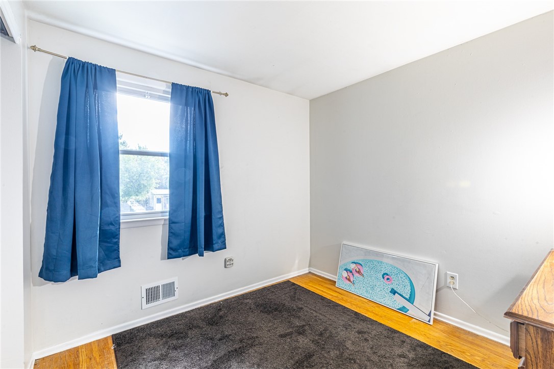 6432 Lakeside Road Ontario, NY 14519 - Photo 23 of 35 Gleaming hardwood floors and a bright window define this versatile secondary space.