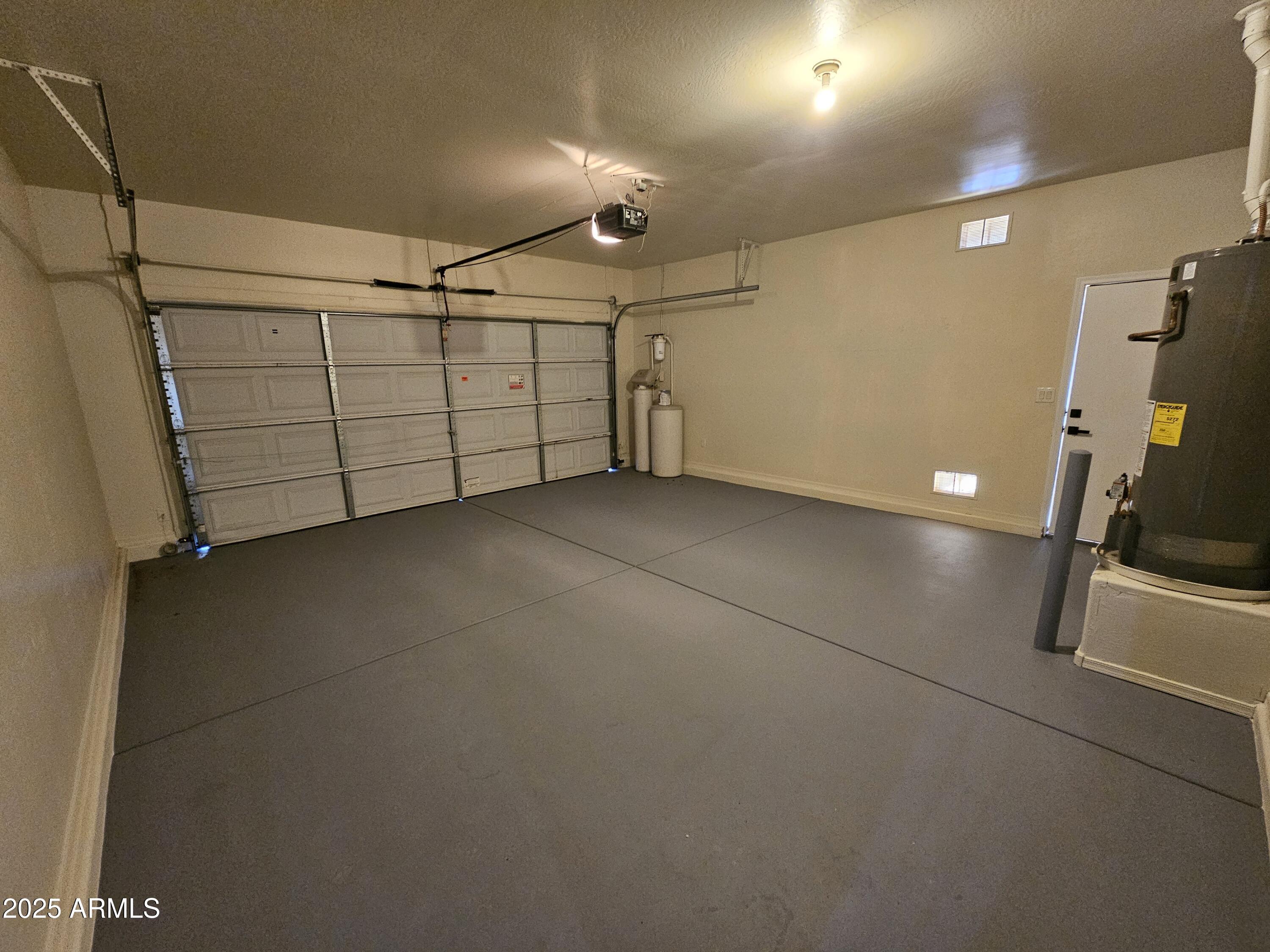 14279 West Boca Raton Road Surprise, AZ 85379 - Photo 18 of 21 Garage