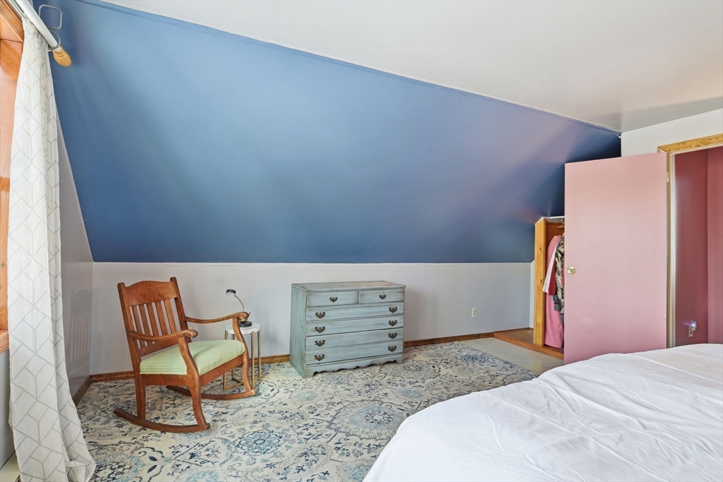 200 Fox Den Road Tolland, MA 01034 - Photo 24 of 37 a bedroom with a bed and a window