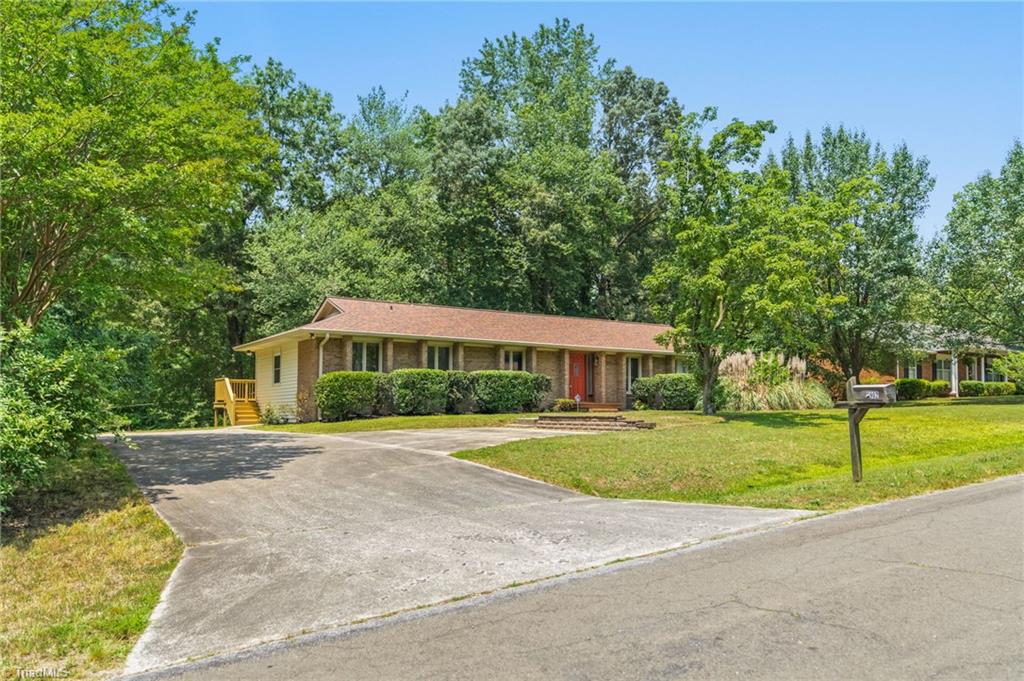 5902 Siler Road Greensboro, NC 27406 - Photo 1 of 49 Welcome to 5902 Siler Rd, a 4 bedroom/3 bath ranch-style home