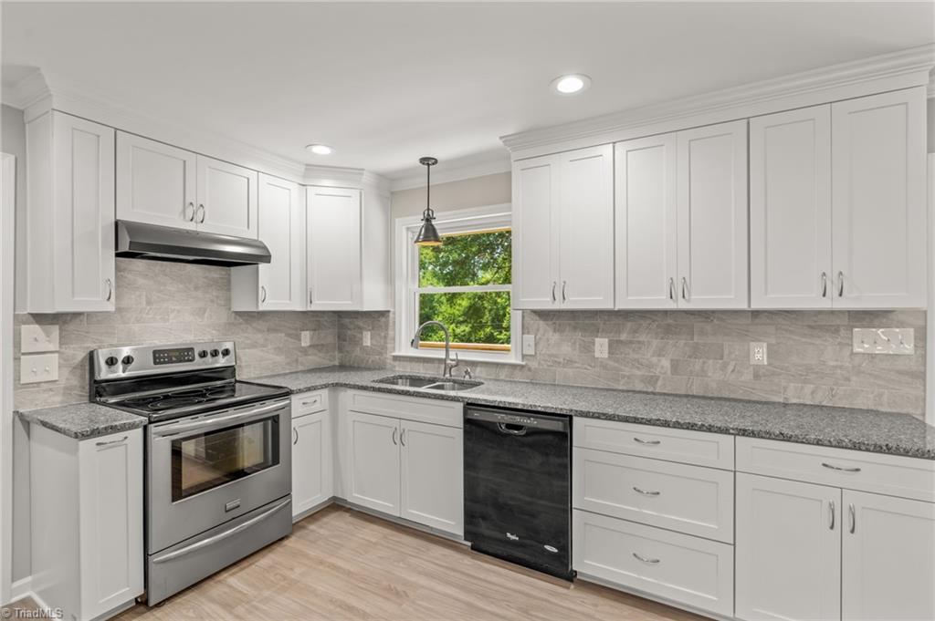 5902 Siler Road Greensboro, NC 27406 - Photo 12 of 49 Lots of counter and cabinet space!